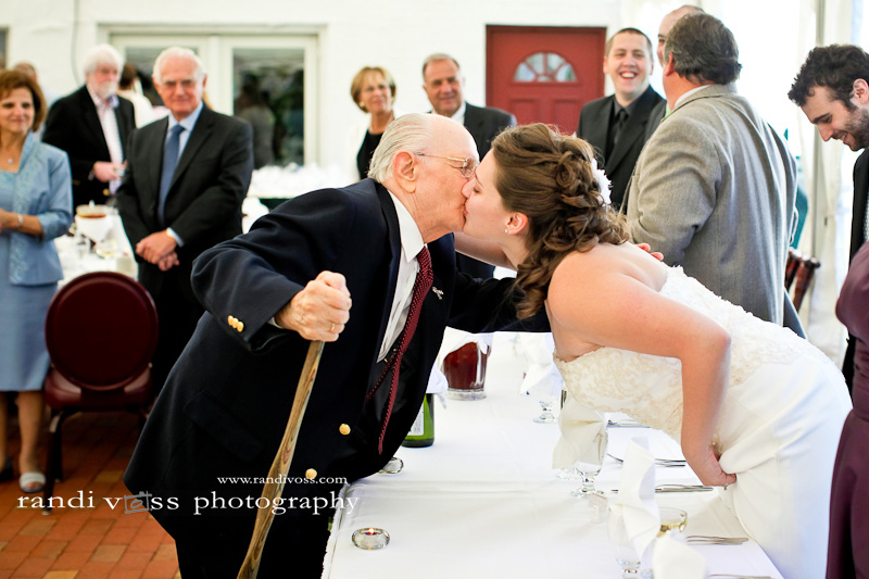 The bride greets the groom's grandfather